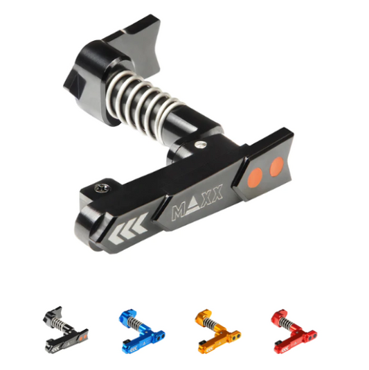 An advanced CNC aluminum magazine release designed for quick and ergonomic magazine reloads, compatible with most M4/M16 Airsoft AEGs. The product is shown in black color with an enlarged contact surface and rubber pads for grip, and includes variants in blue, gold, and red.